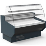 https://donbar.es/wp-content/uploads/2025/11/Vitrina-Expositora-Refrigerada-para-Carniceria-y-Charcuteria-con-Reserva-Cristal-Curvo-Evaporador-Estatico-Serie-NERIA-VEPD-9-C-1505x940x1305h-mm-VEPD-9-15-C-Docriluc.jpg