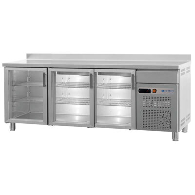 https://donbar.es/wp-content/uploads/2026/04/Frente-Mostrador-Acero-Inoxidable-3-Puertas-de-Cristal-3-Estantes-404-Litros-Gama-600-2017x600x1050h-mm-FBR-200-V-EUTRON.jpg
