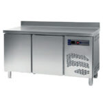 https://donbar.es/wp-content/uploads/2026/04/Mesa-Refrigerada-Acero-Inoxidable-2-Puertas-2-Estantes-250-Litros-Gama-600-1492x600x850h-mm-TRS-150-EUTRON.jpg